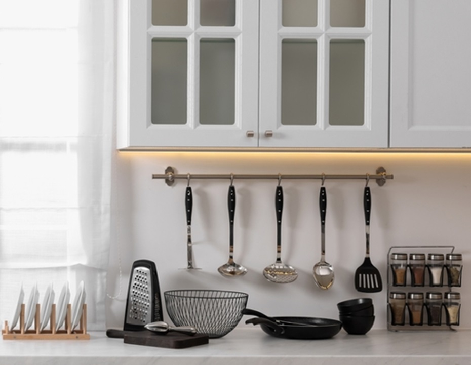 Beautiful kitchen interior with cooking utensils and stylish furniture