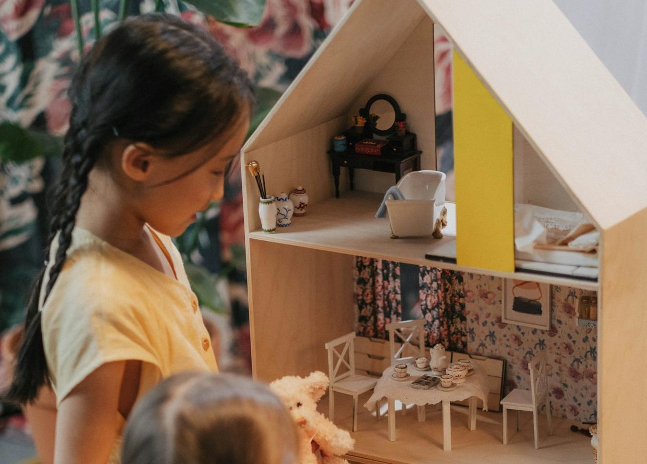 Two Little Girls Holding Bear Plush Toys