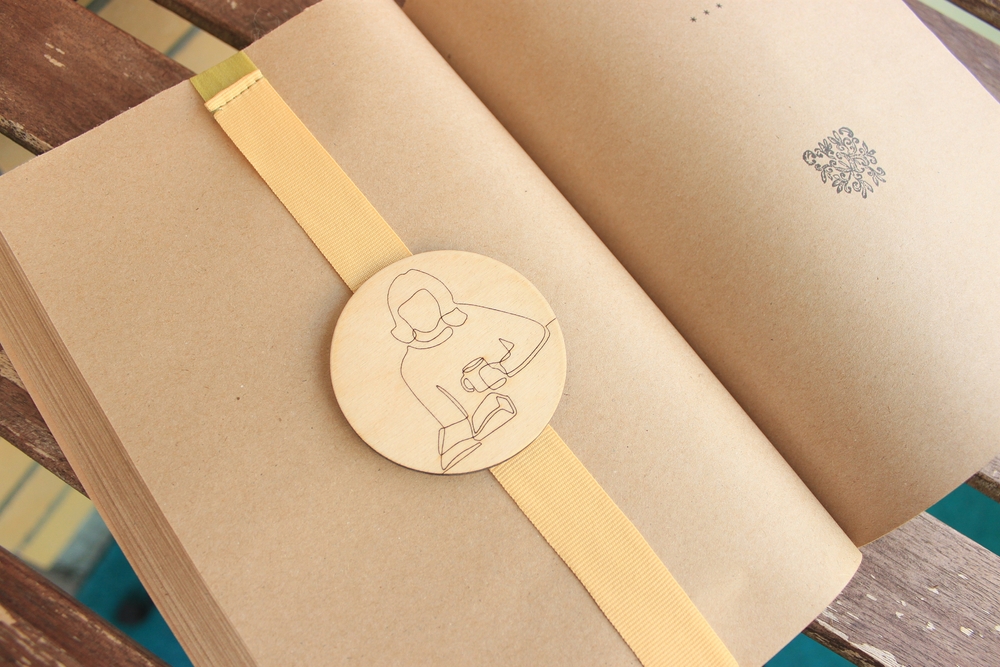 Wooden Bookmark lay in Craft book.
