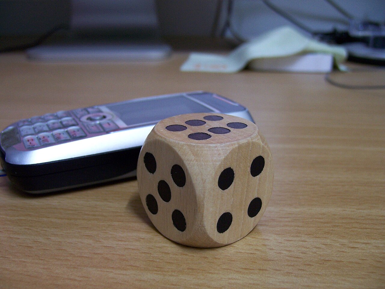 A dice made by wood, a little large than normal - 2005