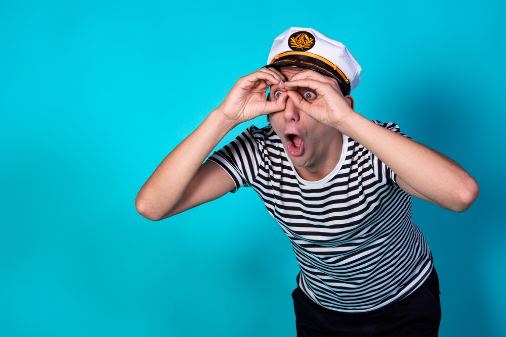 Cheerful young sailor. Expression of emotions.