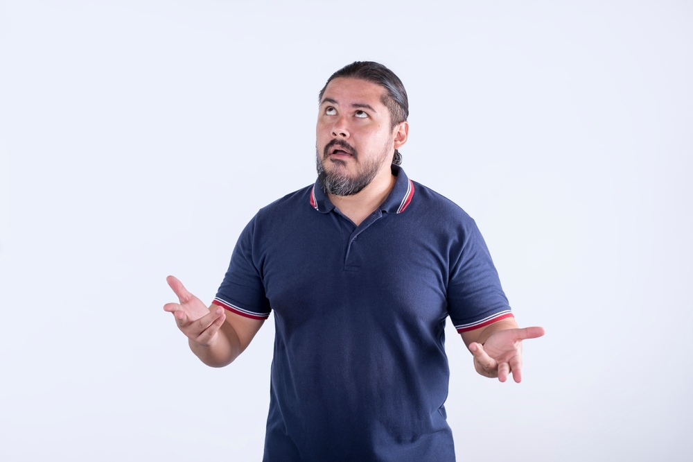 A sarcastic man in his 30s says dug and sighs.