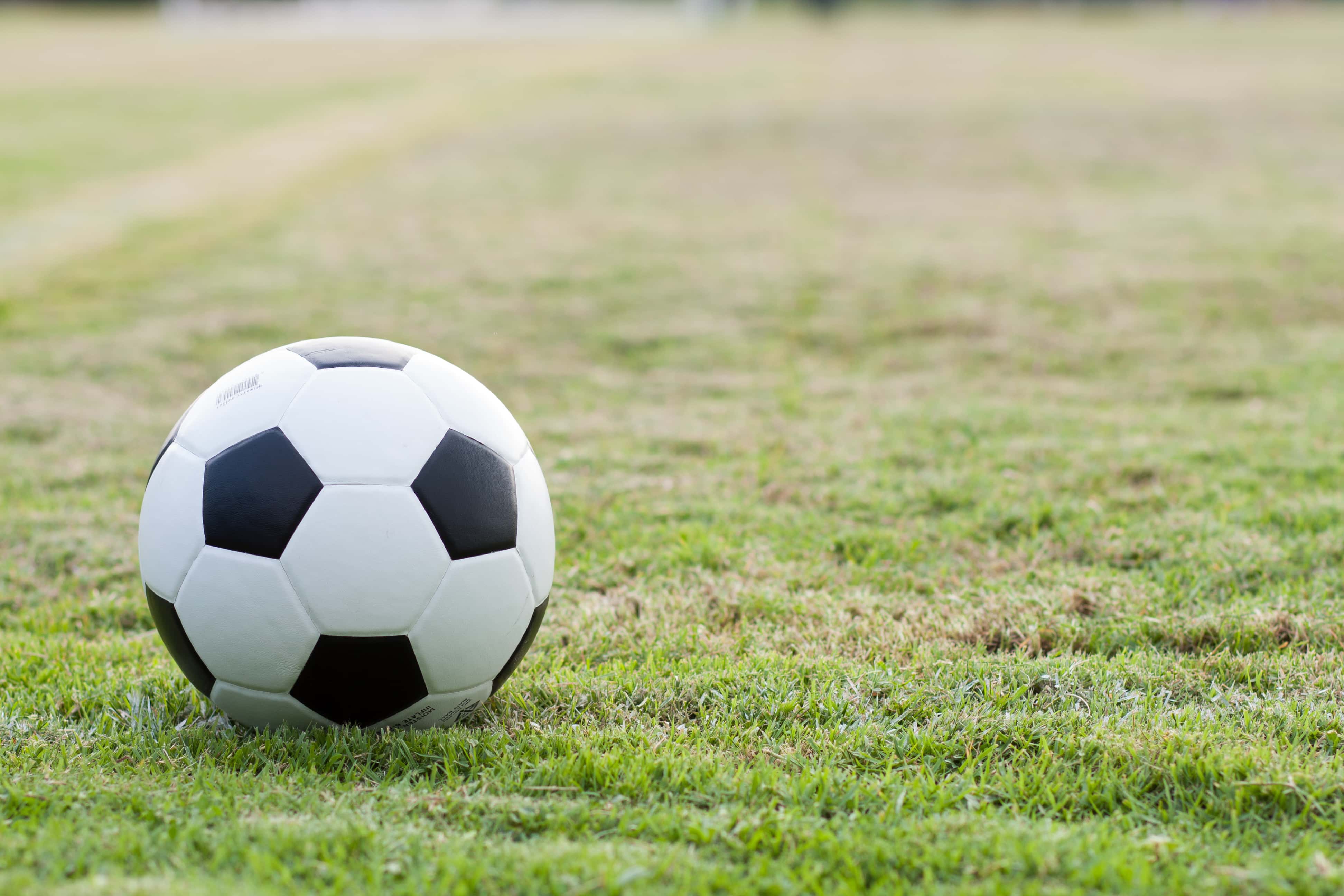 Close-Up Of Soccer Ball On Playing Field.