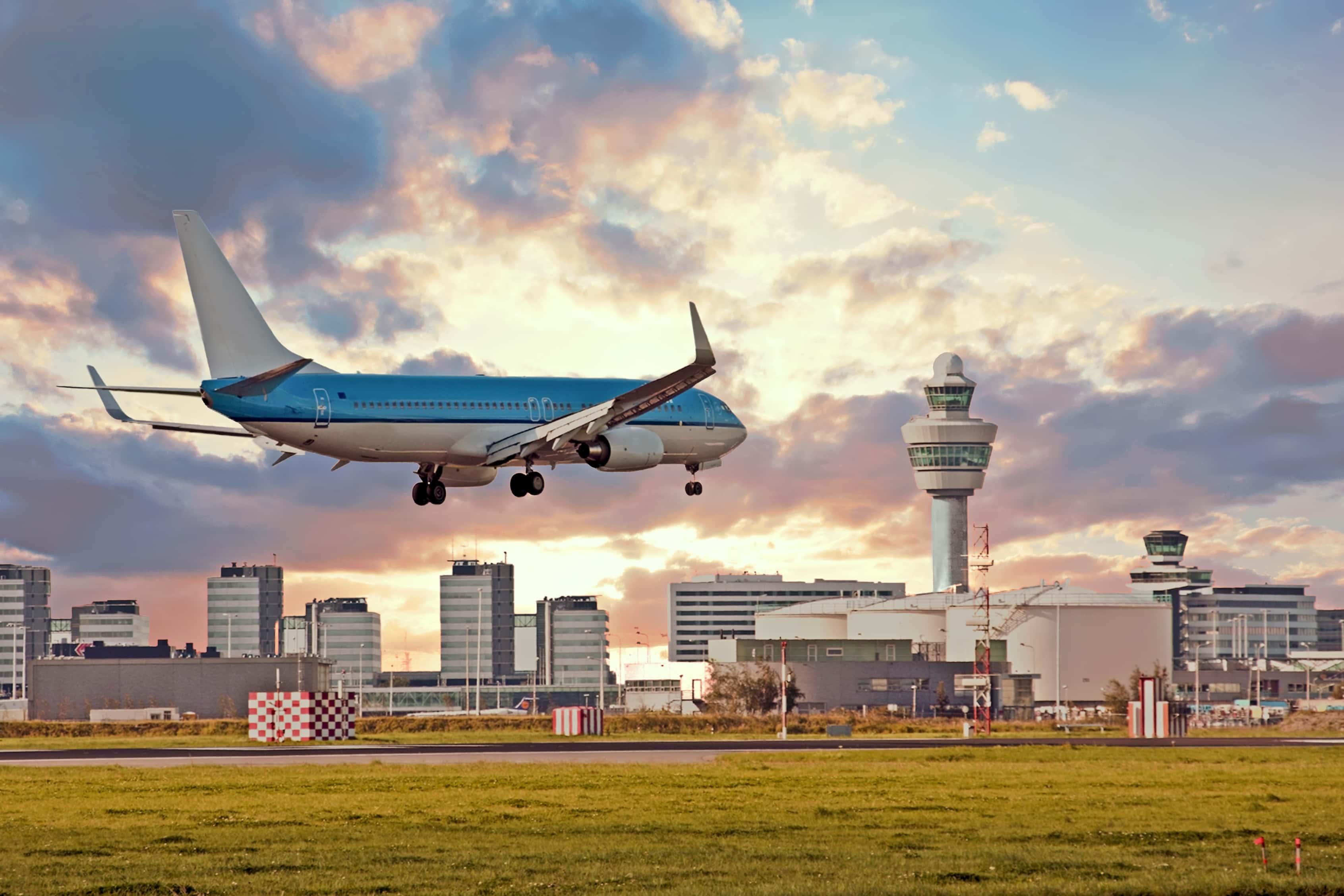 Airplane landing on Schiphol airport in Amsterdam, Netherlands.